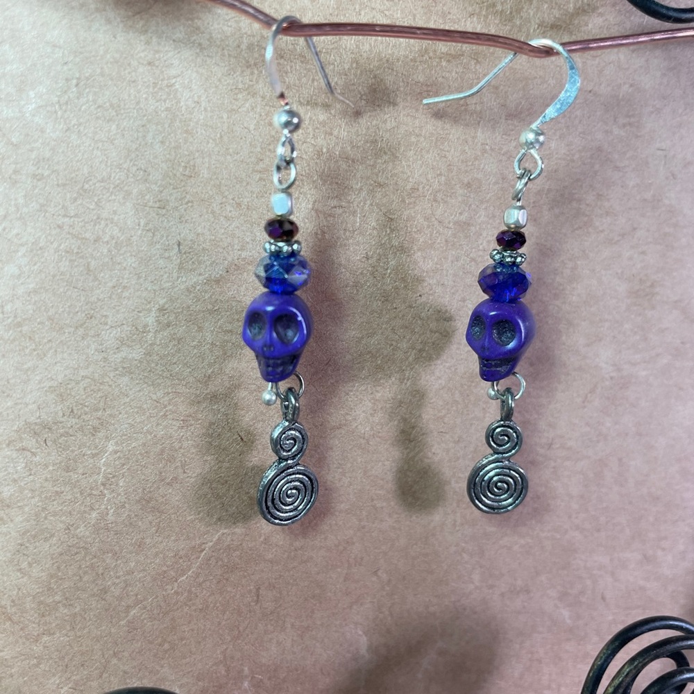 Purple skull head earings